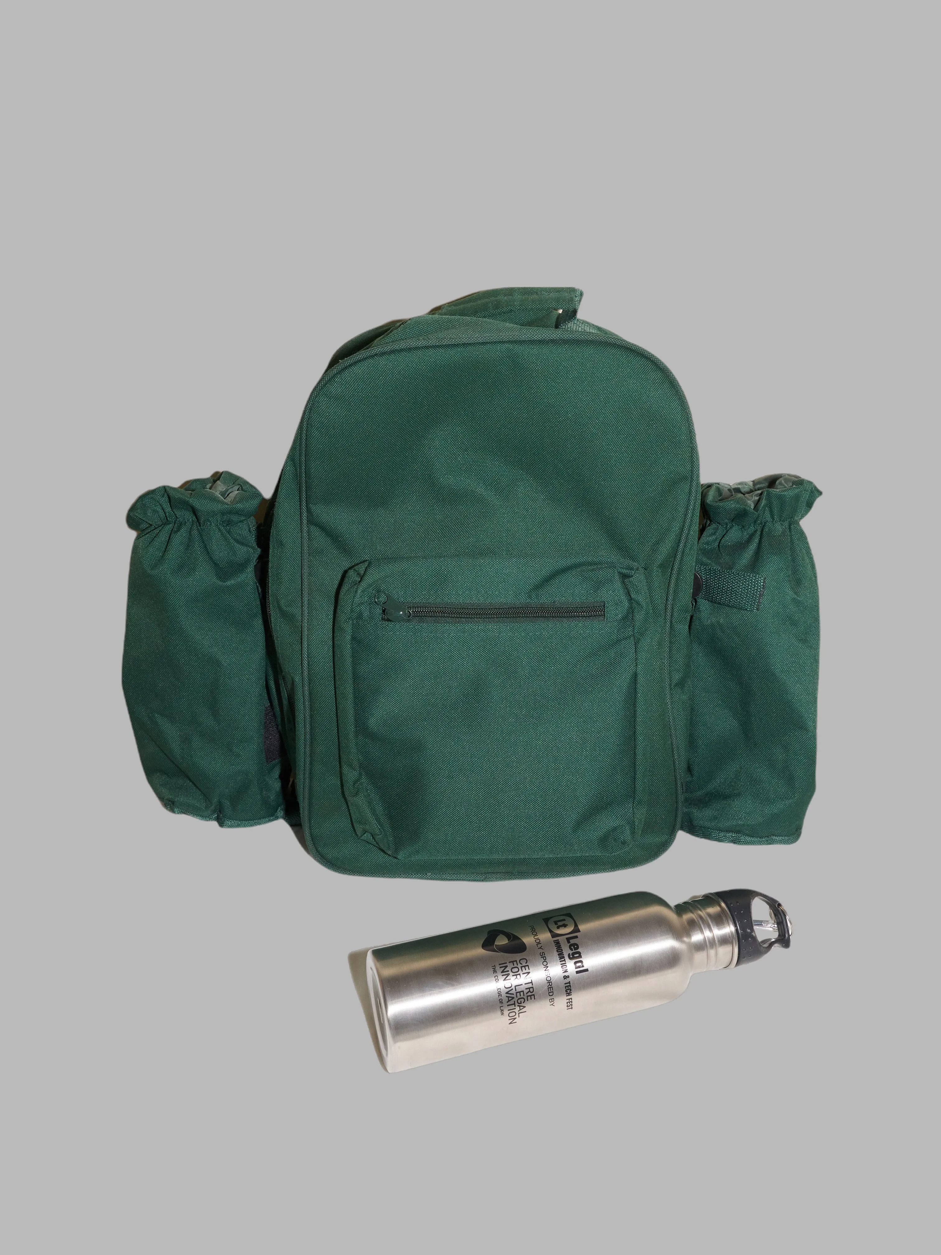 Green canvas “Lt Legal innovation and tech fest” backpack with full picnic set